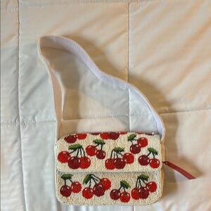 Kelly & Katie Cream and Red Crossbody Bag with Cherry Print